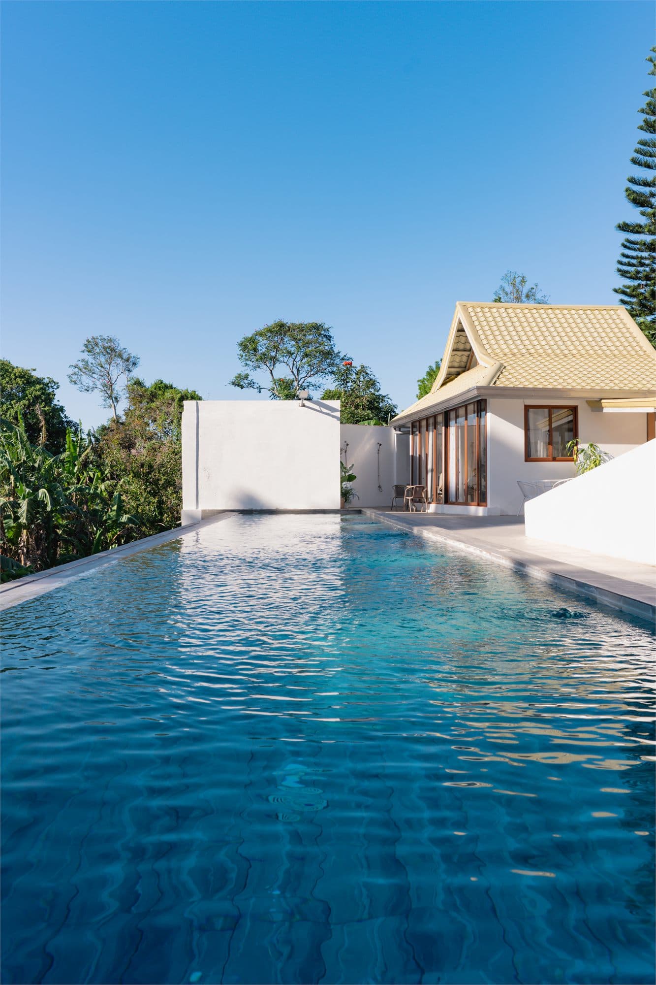 Infinity pool overlooking tropical gardens at Huni, Silang Cavite